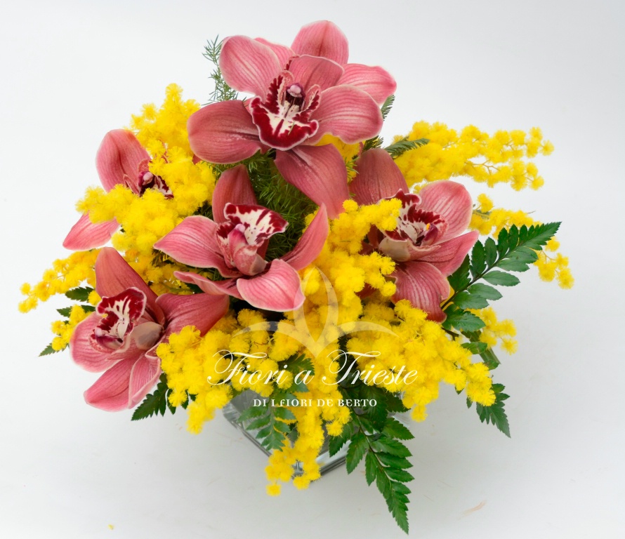 Foto Vetro con cymbidium e mimosa